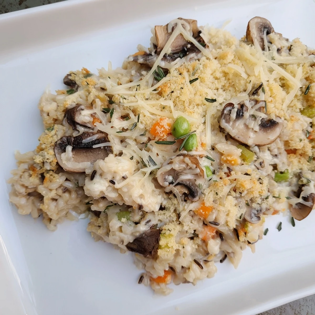 Delicious, creamy Creamy Mushroom and Wild Rice Casserole with a crispy breadcrumb topping, perfect side dish.