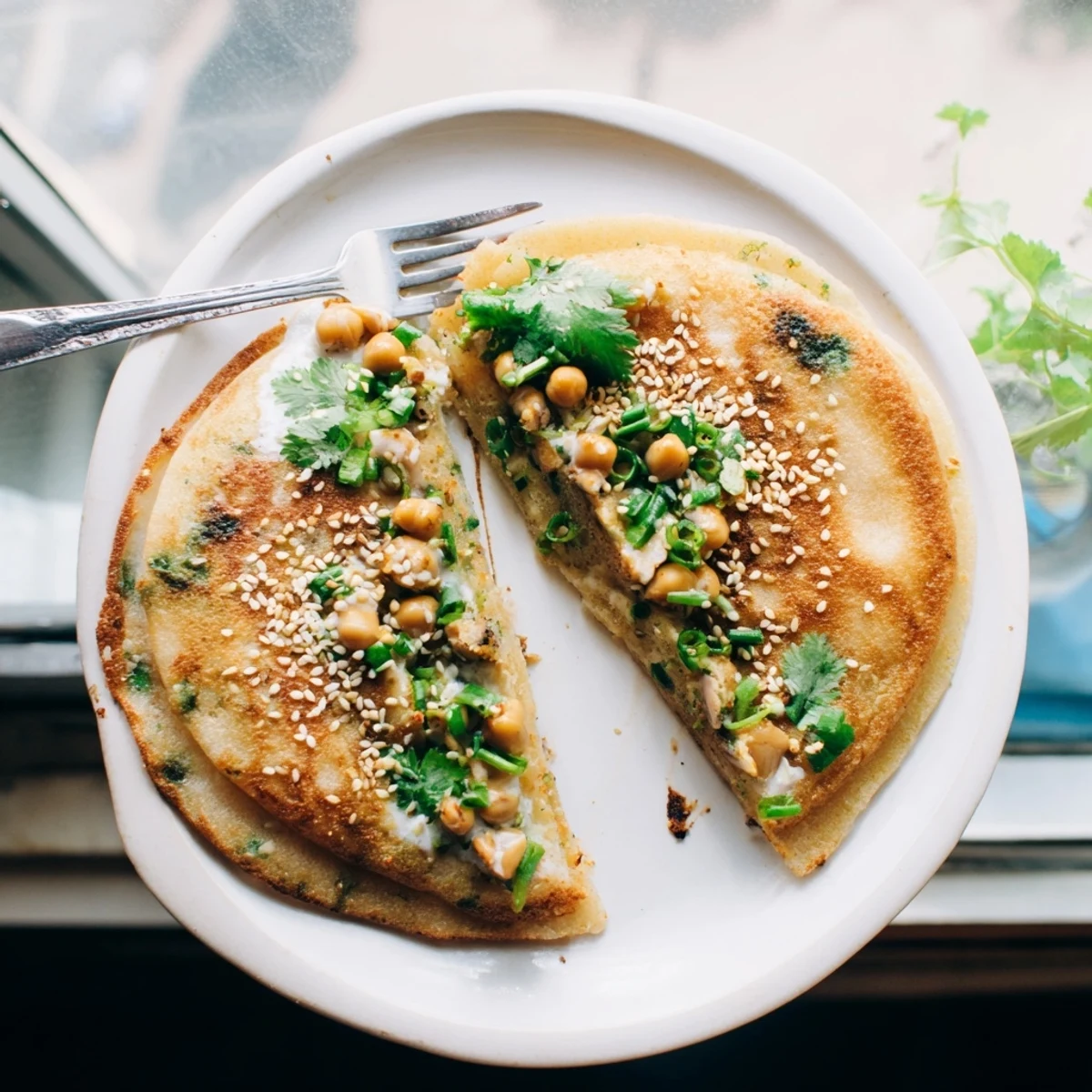 Crispy Burmese Mont Lin Ma Yar street snack filled with mashed chickpeas and sesame seeds